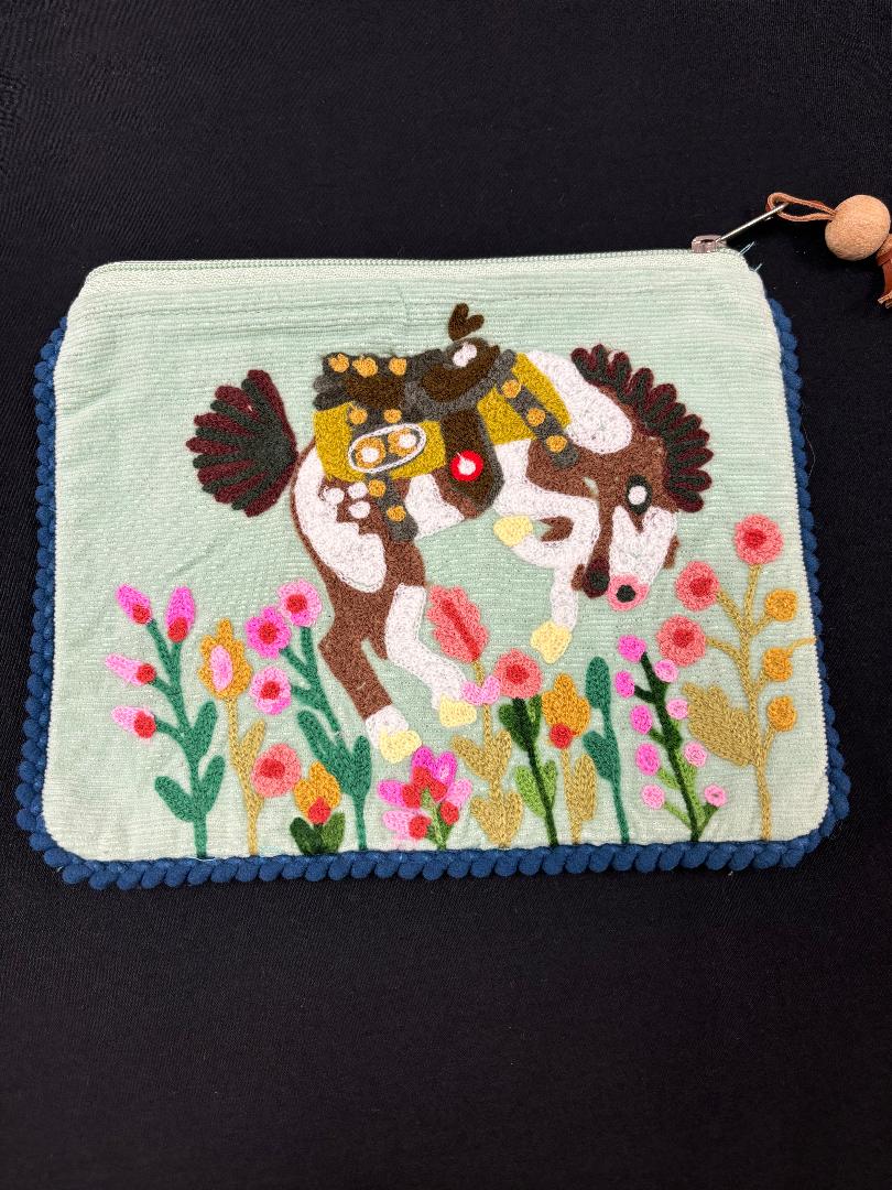 Karma Living Pouches and Clutches