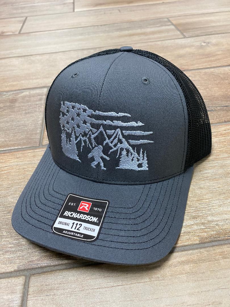 Bigfoot with Flag & Mountains Backgroup Snapback Hats