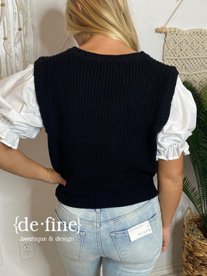 Black Sweater Vest with White Puff Sleeve Layer