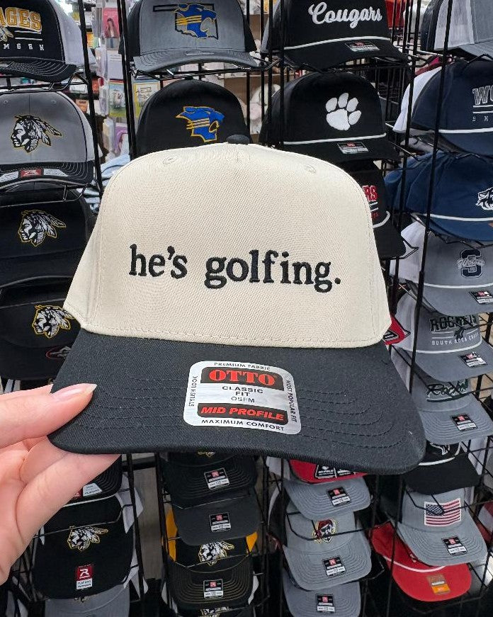 He's Golfing Otto Classic Hats