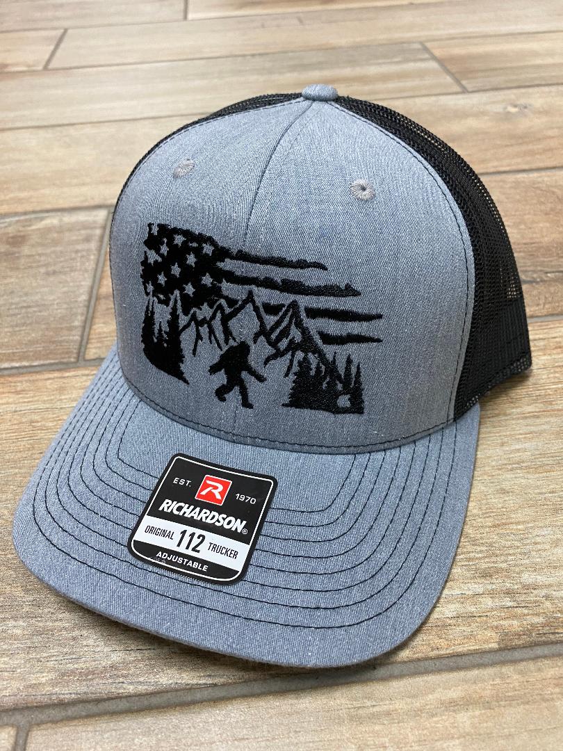Bigfoot with Flag & Mountains Backgroup Snapback Hats
