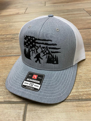 Bigfoot with Flag & Mountains Backgroup Snapback Hats